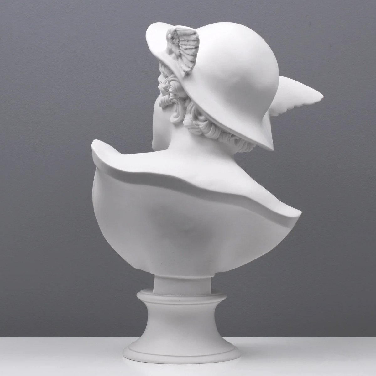 Rear view of Mercury Bust showing winged helmet and sculpted curls