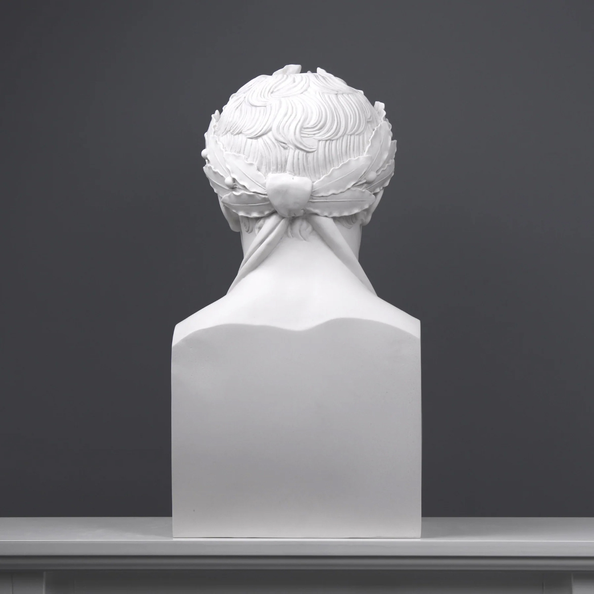 Rear view of white marble Empire Bust with laurel wreath
