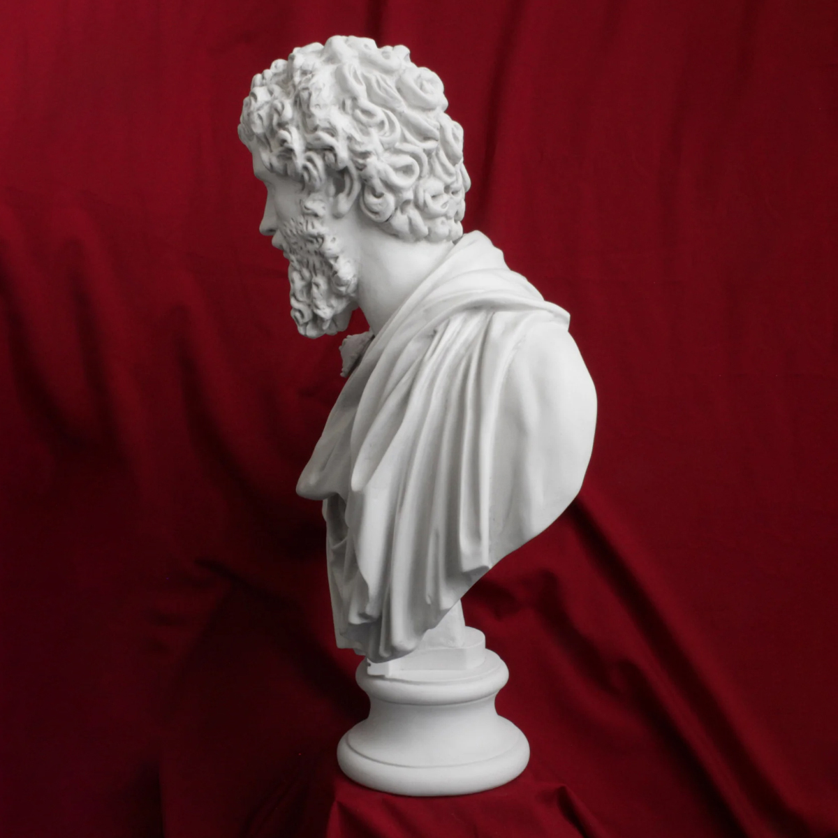 Septimius Severus Bust, highlighting the textured beard and Roman-style drapery in marble