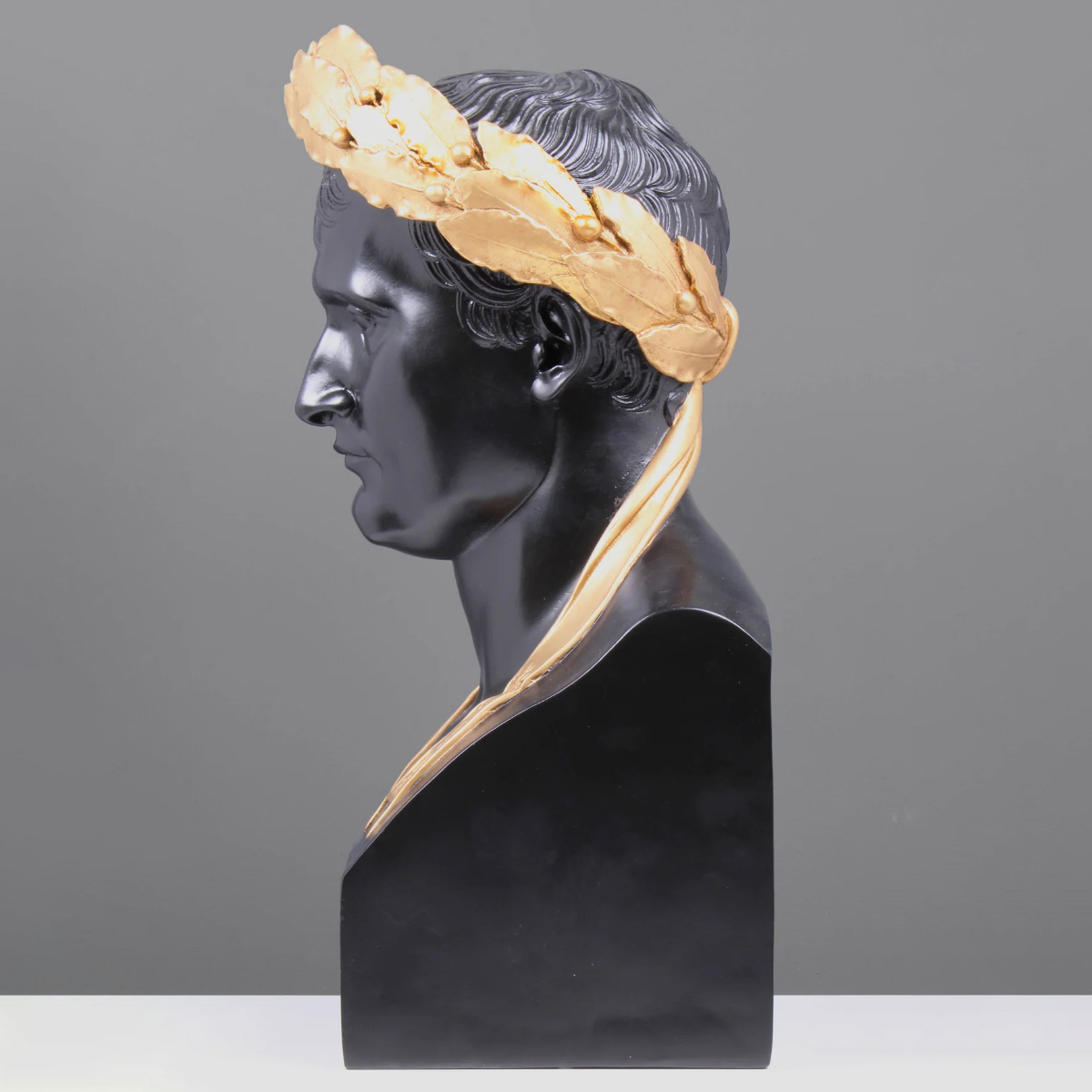 Side angle of marble Napoleon Bonaparte bust sculpture with neoclassical style detailing
