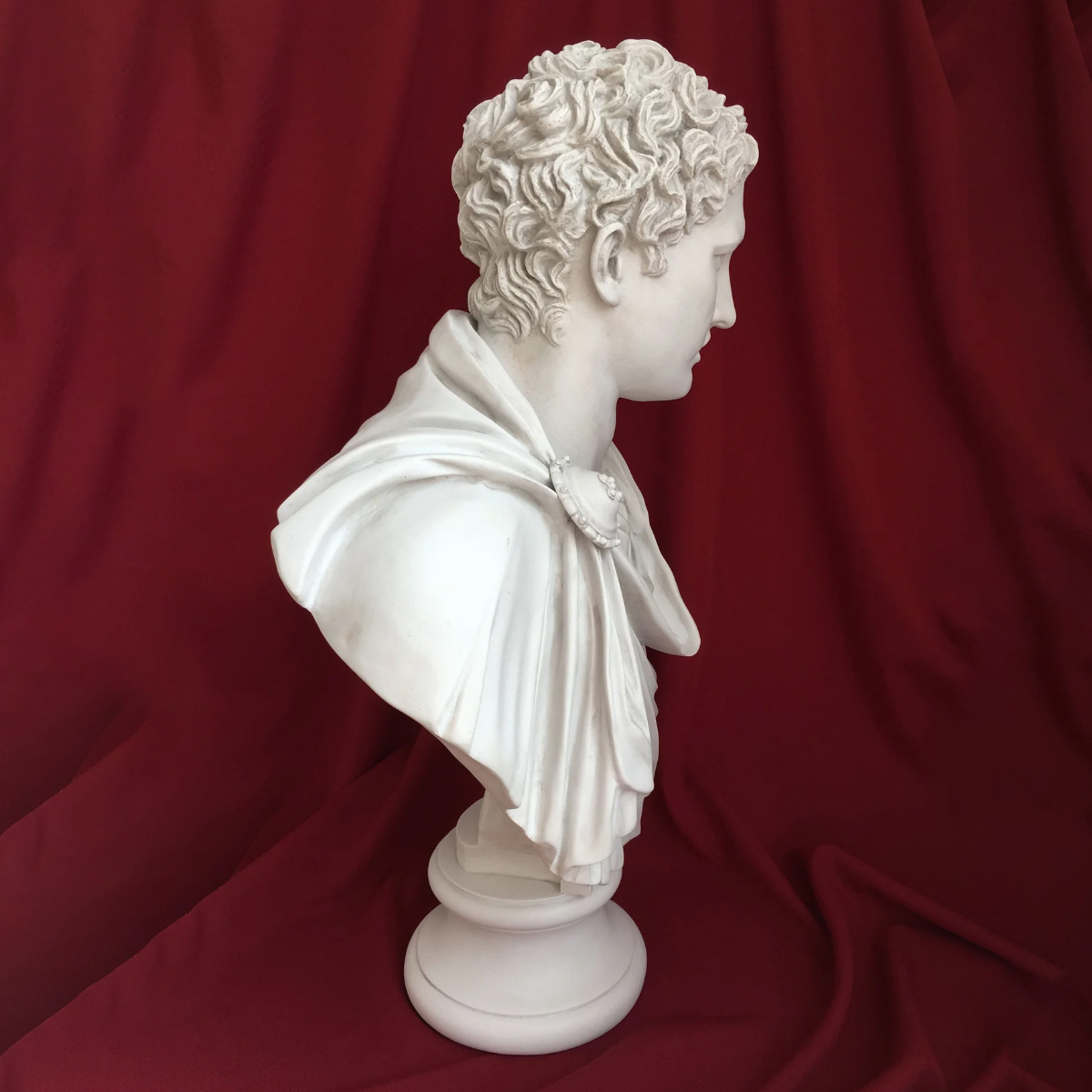 Side profile of Marc Antony Bust in marble, featuring classical Roman drapery