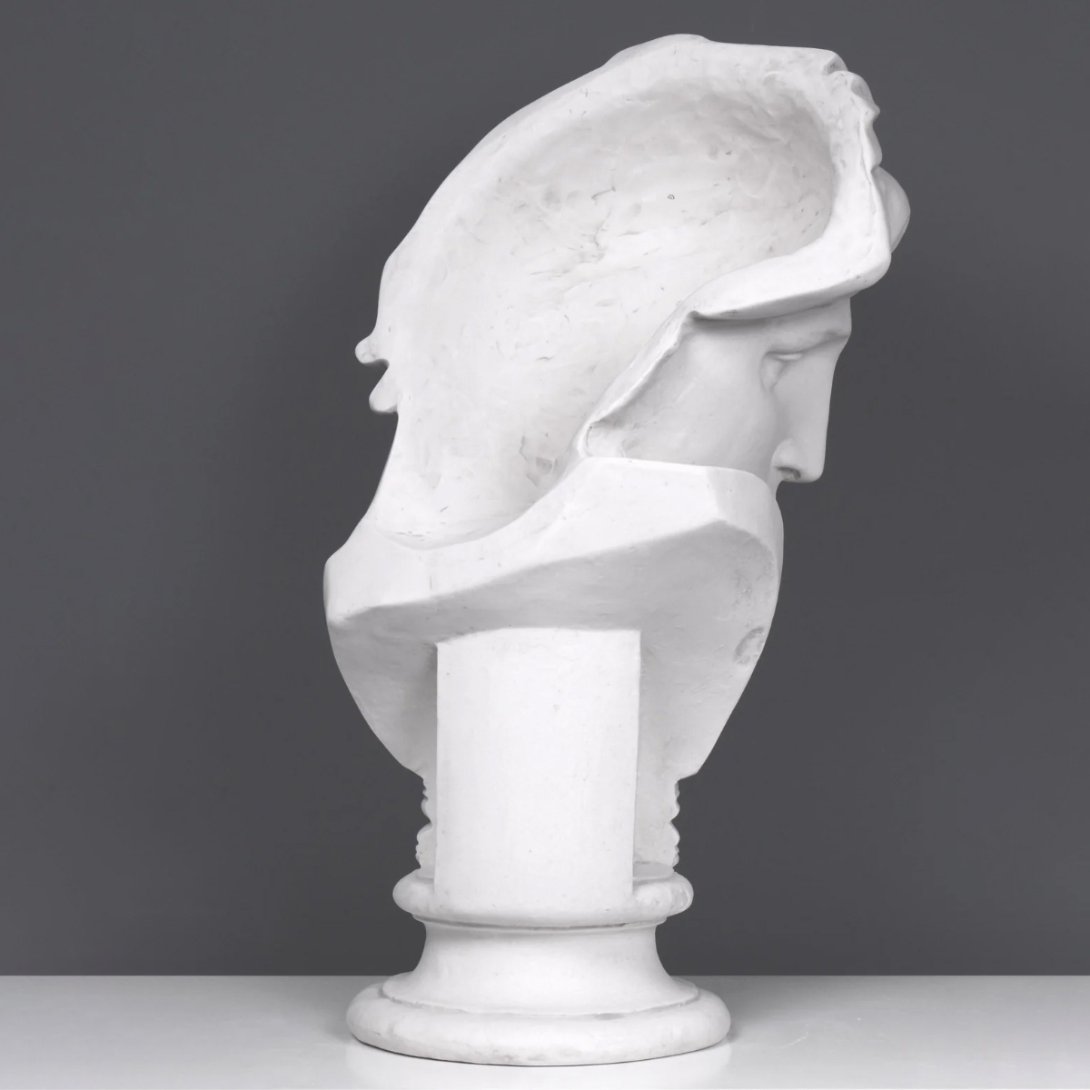 Side view of marble Aurora Bust reproduction, showing gentle profile and draped head covering
