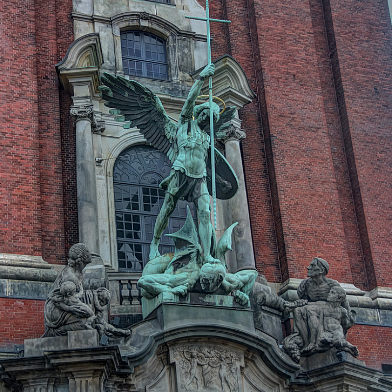 St. Michael statue above church entrance in Hamburg