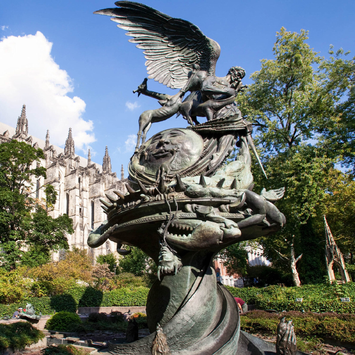 Wide view of the Peace Fountain sculpture near St. John the Divine Cathedral in NYC