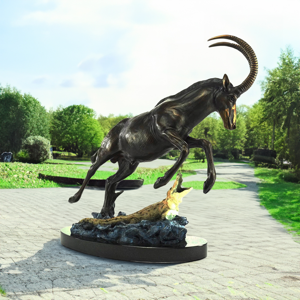 bronze Antelope and Crocodile Sculpture depicting a sable antelope leaping to escape a crocodile attack