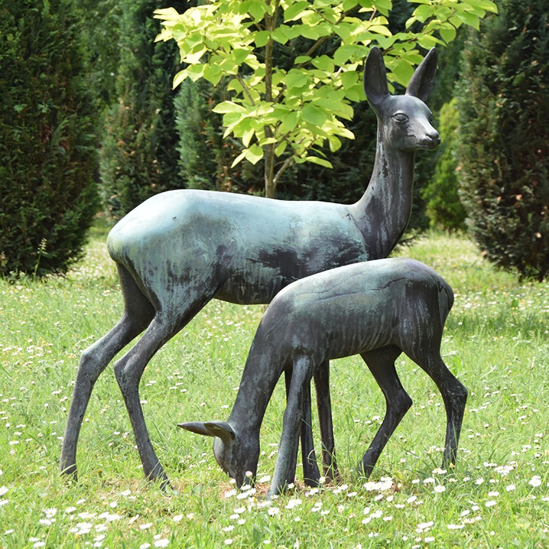 bronze Doe and Fawn Figurine in garden