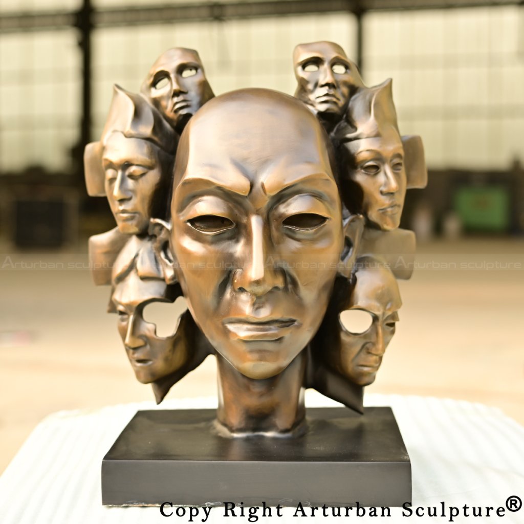 Finished Custom Face Sculpture in bronze, mounted on a square base