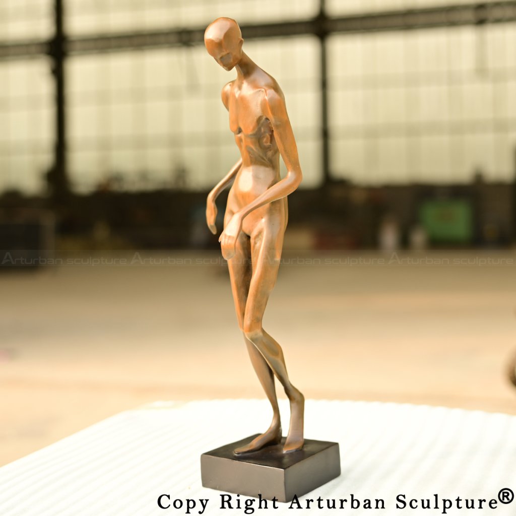 4-Abstract human sculpture in bronze finish