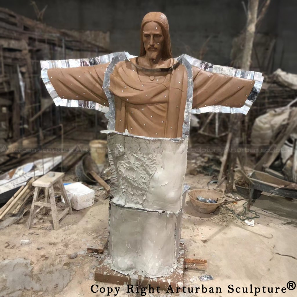 Mold-making process for the Jesus Christ the Redeemer Statue, with clay model partially covered in plaster for casting