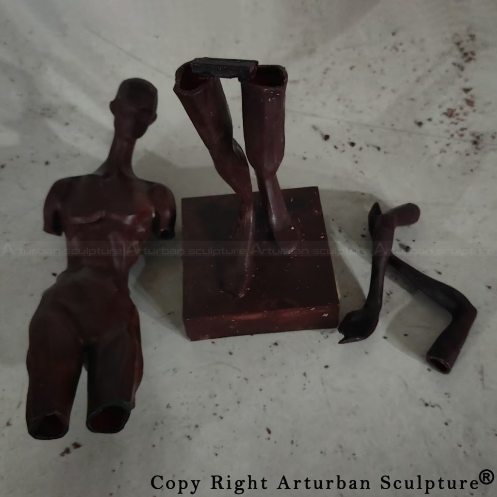 6-wax model of abstract human sculpture before bronze casting