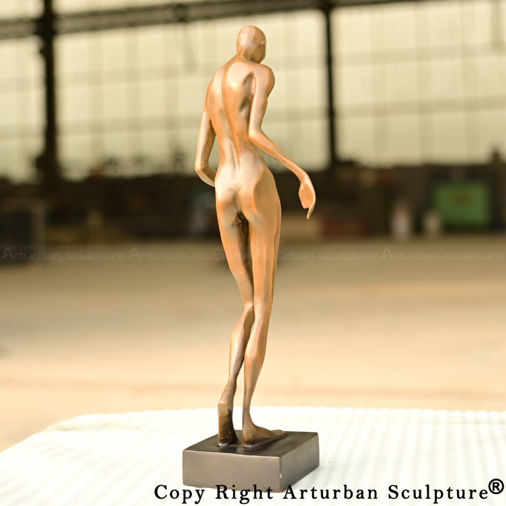 7-Front-facing Abstract Sculpture Art piece with faceless head and streamlined human form