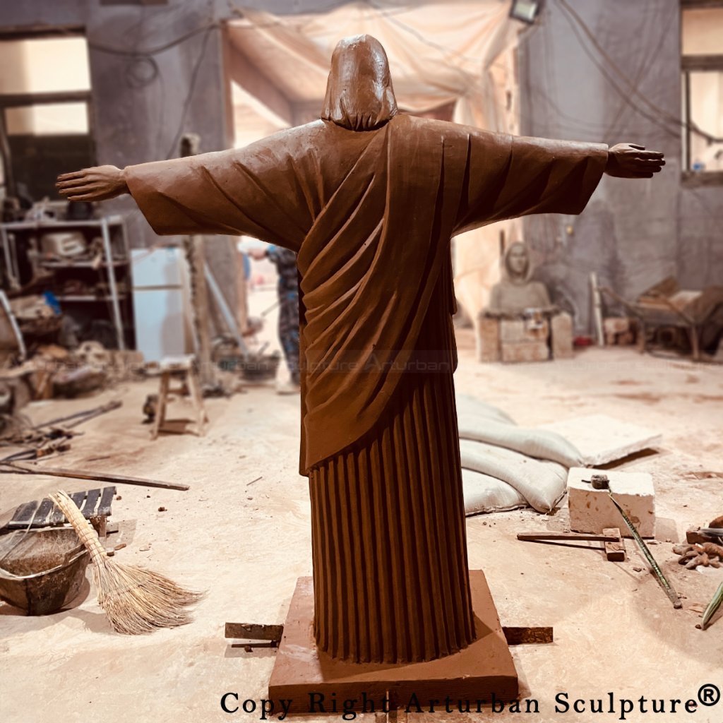 Back view of the clay Jesus Christ the Redeemer Statue