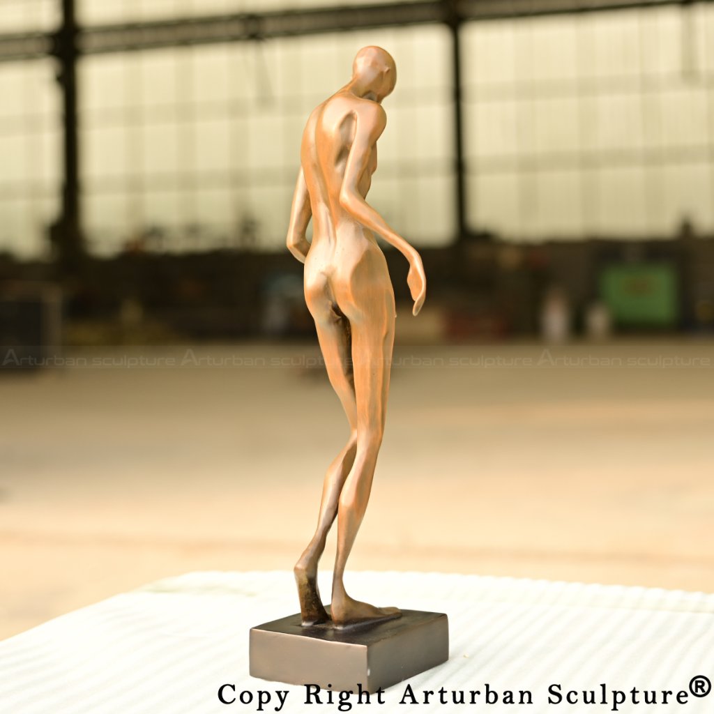 9-Bronze abstract human sculpture with stylized muscles and gentle twisting posture