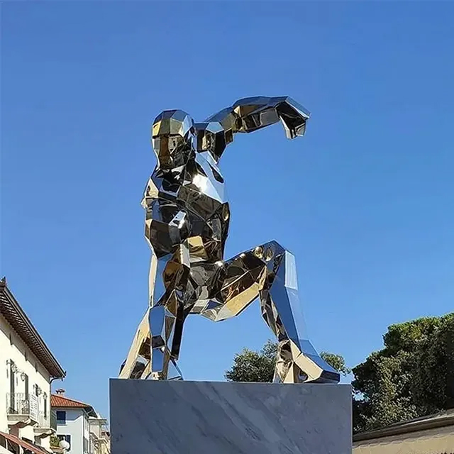 A mirror-polished Iron Man Man of Steel Statue captured in landing pose