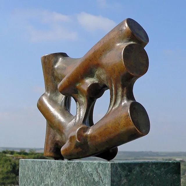 Abstract Shape Sculpture in bronze by Kamen Tanev placed outdoors