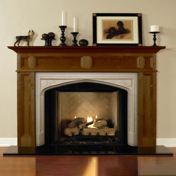 Antique Marble Mantle displayed with wood surround and lit fireplace