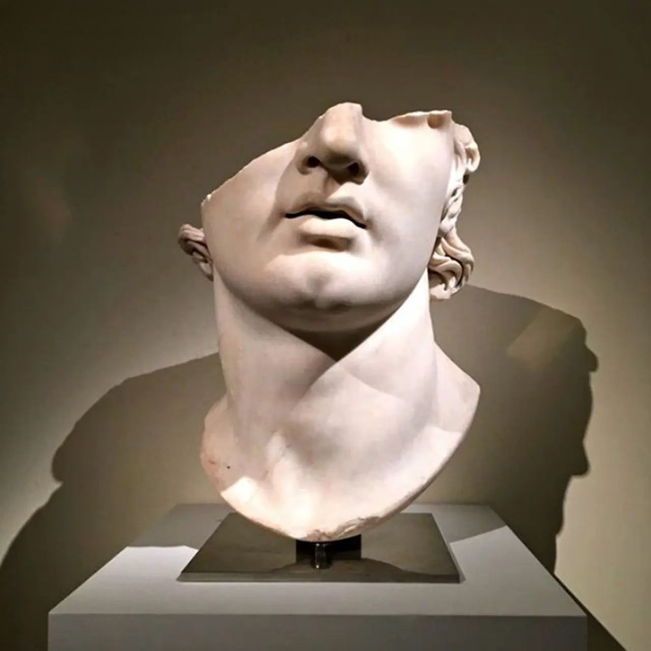 Broken Head Statue made of marble from the Hellenistic period