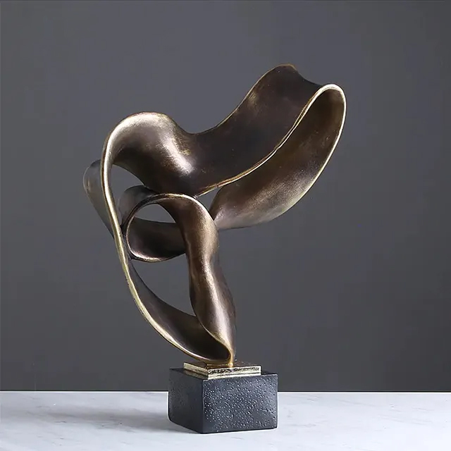 Bronze Abstract Sculpture Decor with sweeping lines and open-form structure