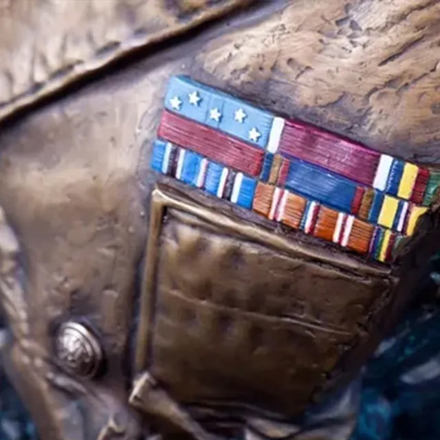 Bronze Navy Sculpture featuring detailed military ribbons on uniform pocket