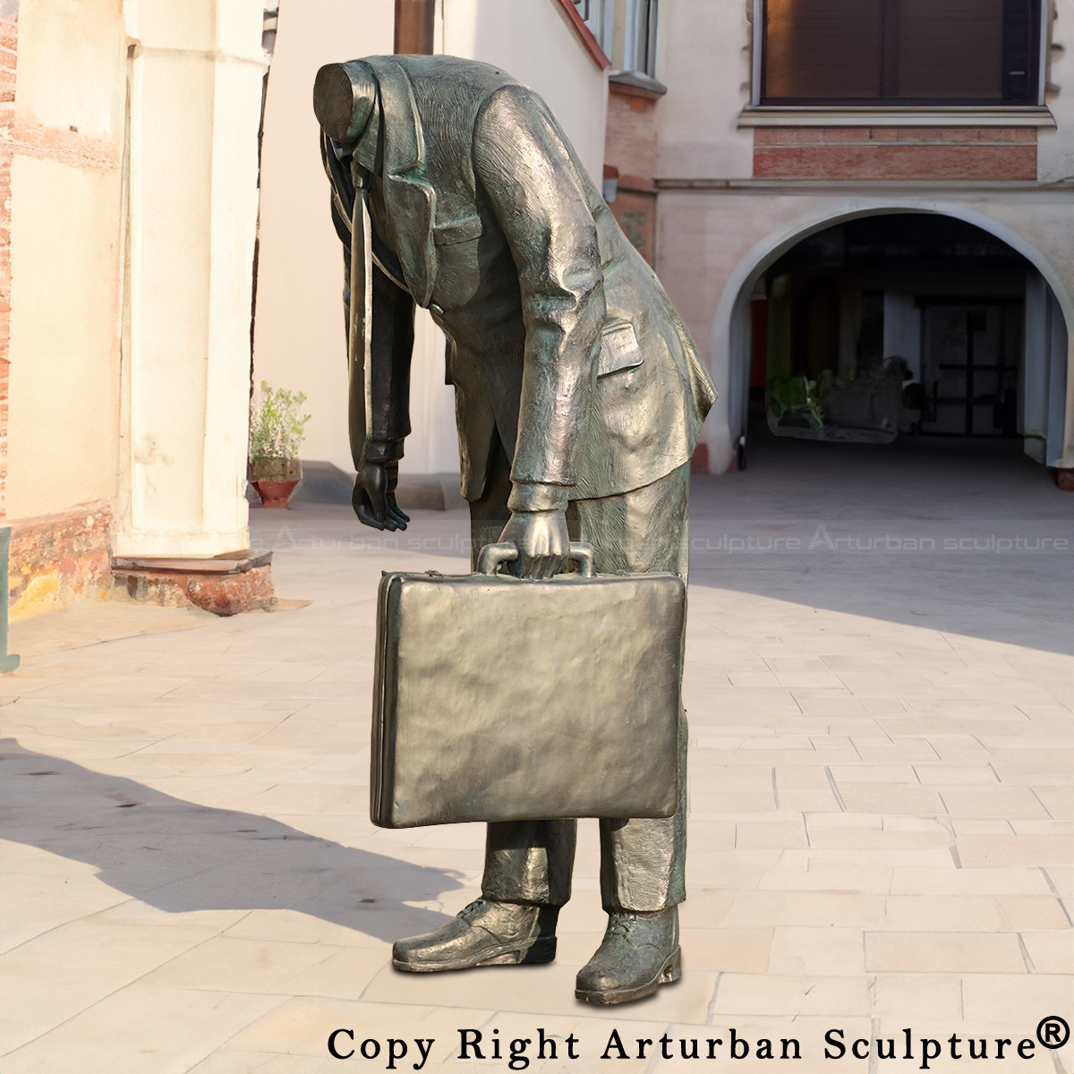 Bronze Terry Allen Sculpture of headless businessman leaning forward with briefcase
