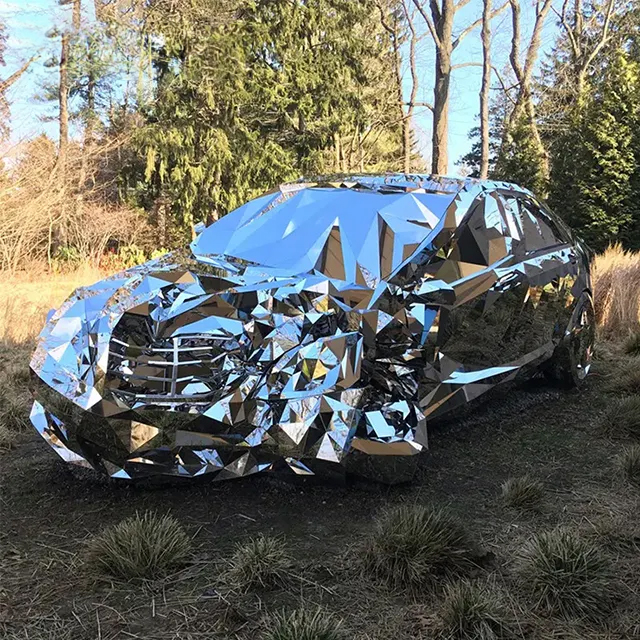 Car Crash Sculpture made of stainless steel panels representing a wrecked Mercedes-Benz S550