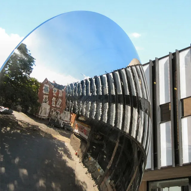 Close-up of Sky Mirror Sculpture in stainless steel