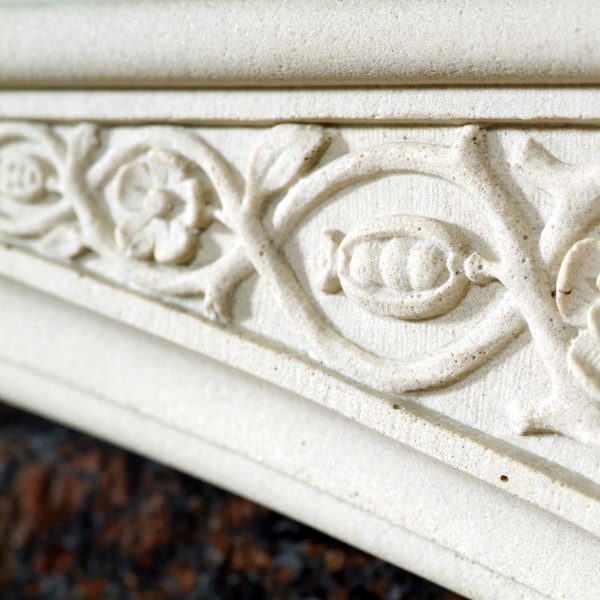 Close-up of Tudor floral carving detail on Antique Marble Mantle