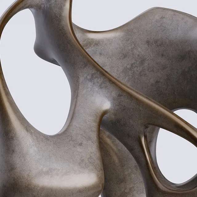 Close-up of a small abstract bronze sculpture