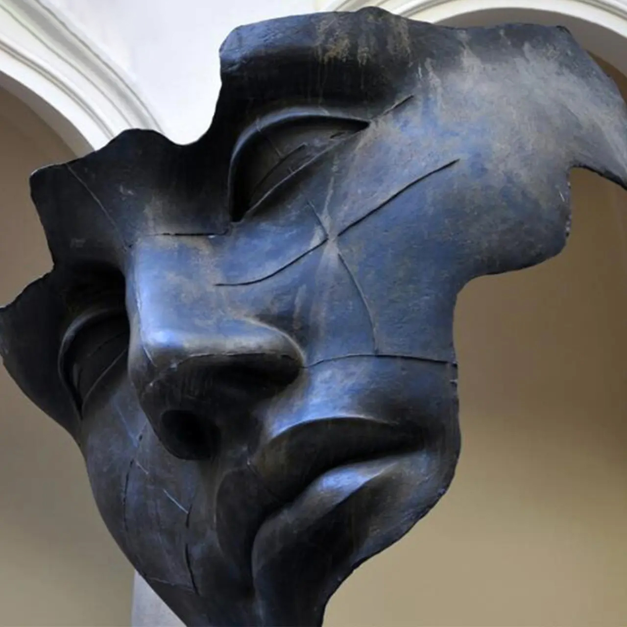 Close-up of bronze Broken Face Statue