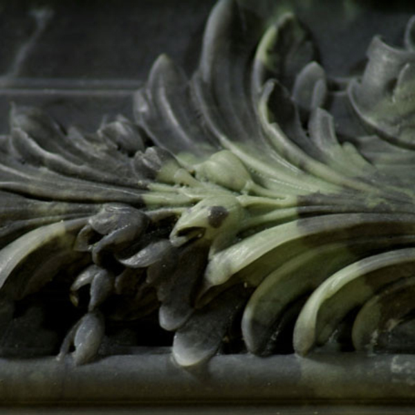 Close-up of leafy acanthus detail from green Marble Mantel for Fireplace