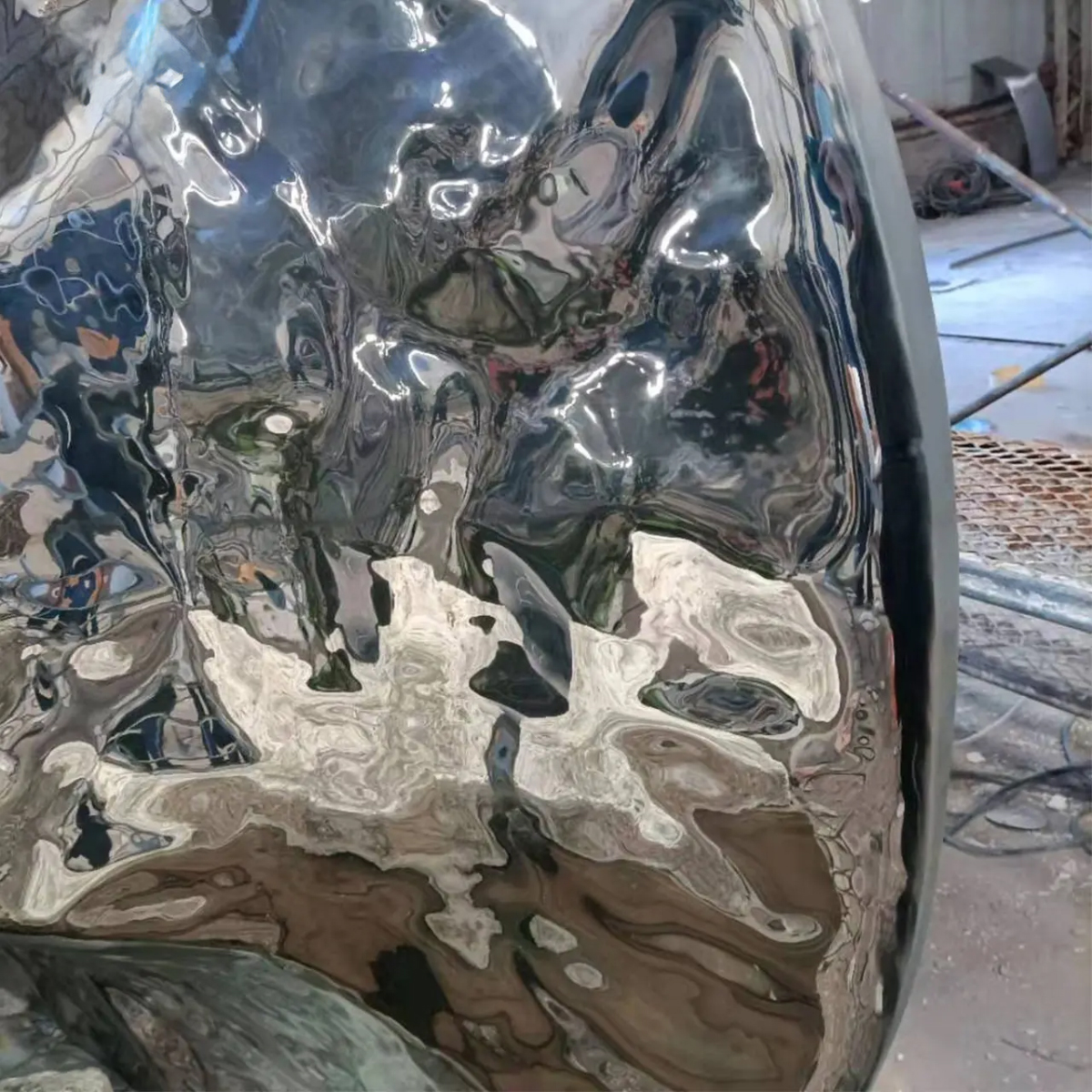 Close up of the stainless steel Apple Core Sculpture