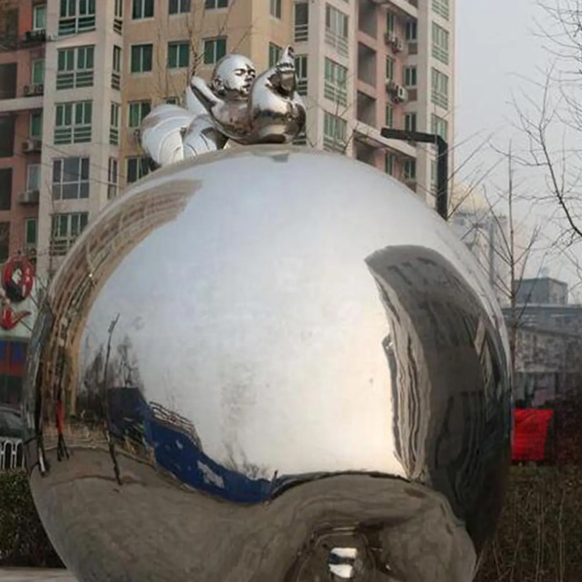 Close-up of the stainless steel apple sculpture
