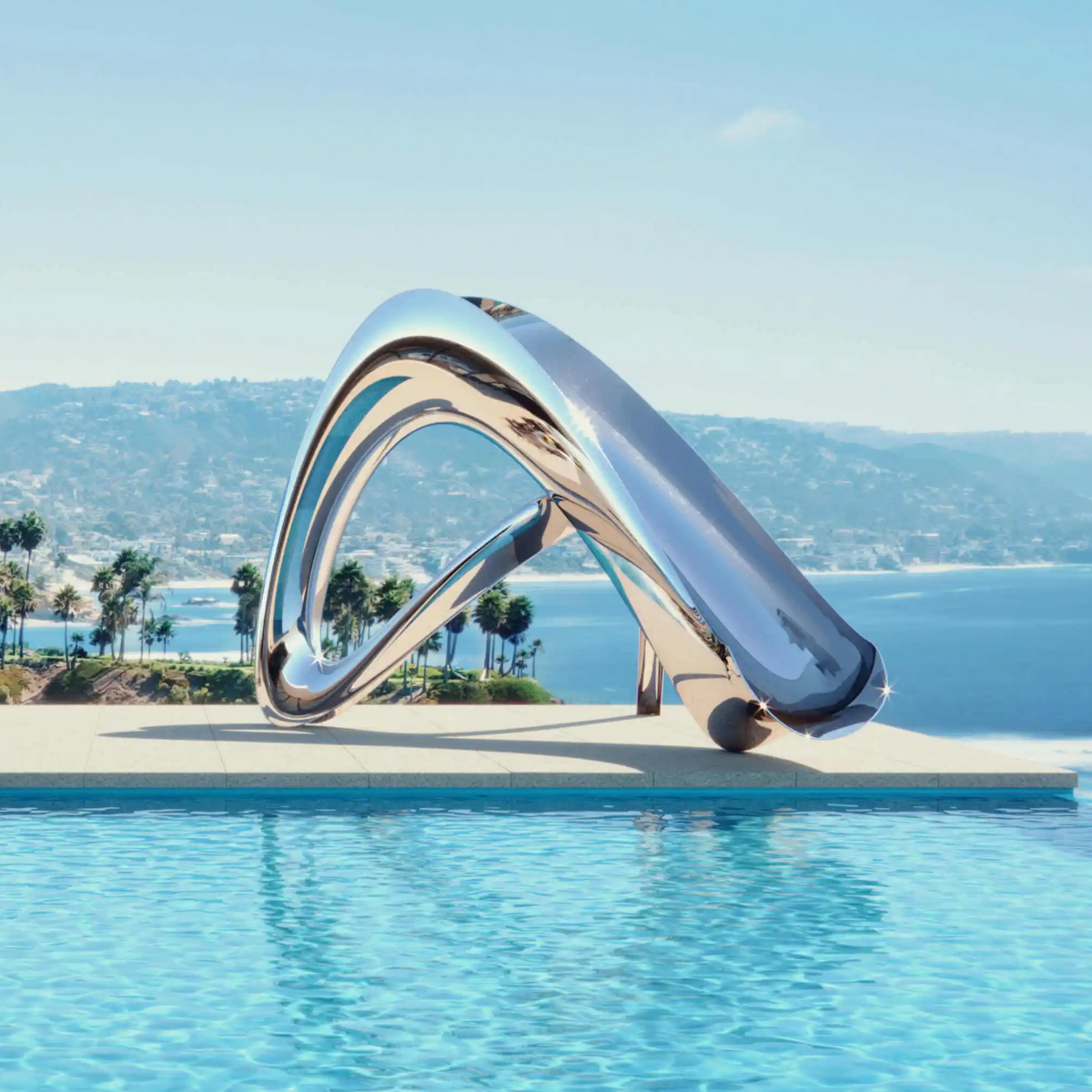Contemporary stainless steel Slide Sculpture installed beside an oceanfront pool
