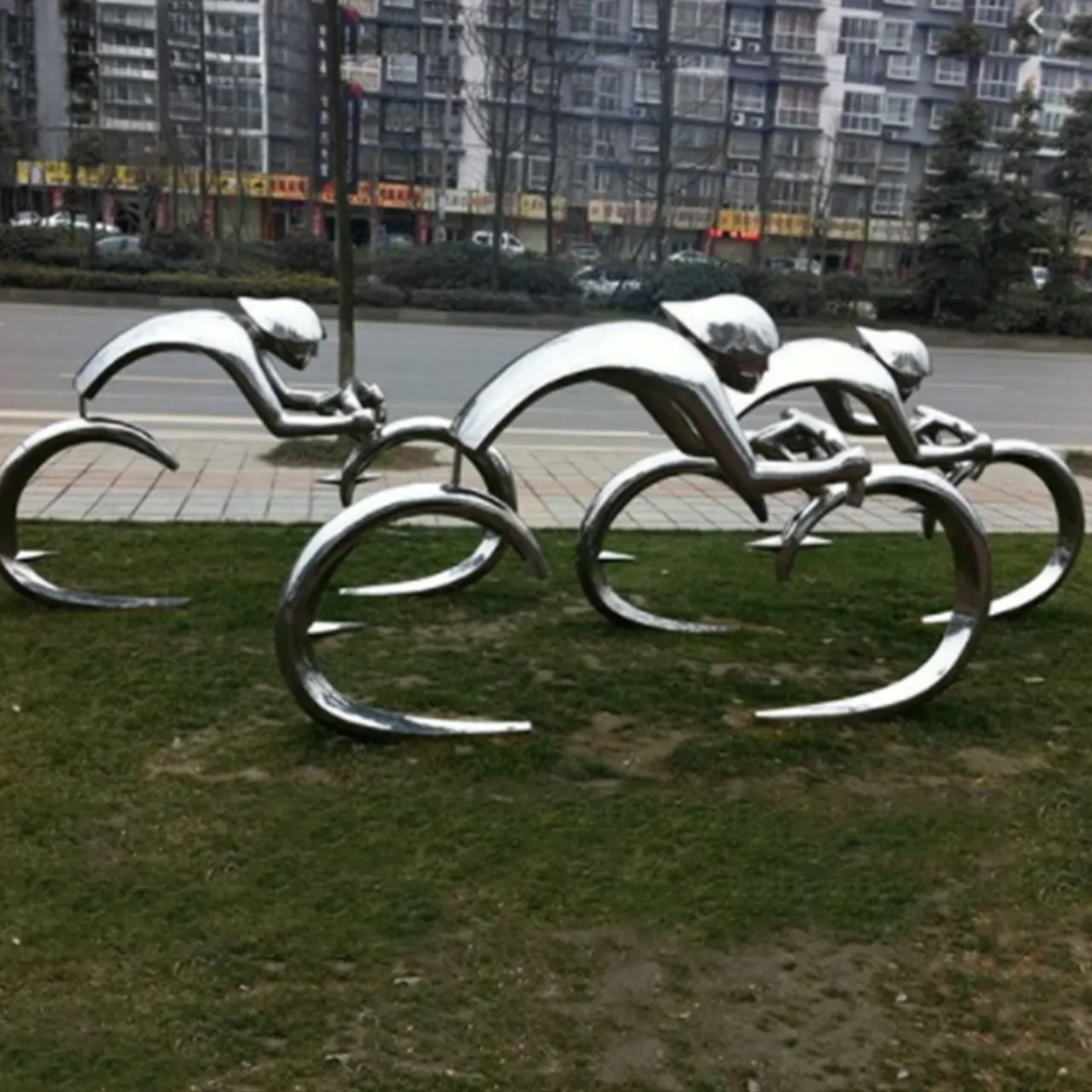 Cycle Statue stainless steel sculpture of racing cyclists
