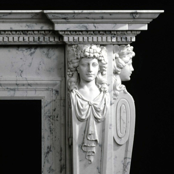 Detailed carving on Italian Marble Mantel showing caryatid female figure with draped garment