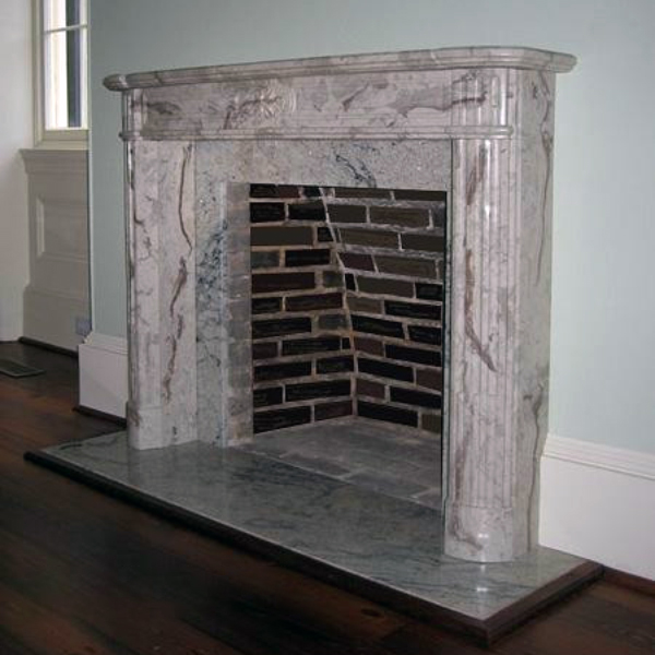French Style Fireplace Surround installed in a traditional interior
