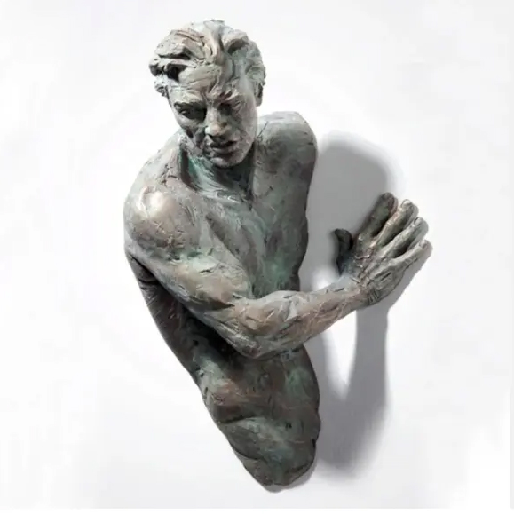 Matteo Pugliese Art bronze sculpture of a man emerging from a wall