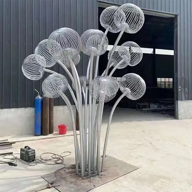 Metal Dandelion Garden Sculpture featuring a cluster of large dandelion heads crafted from radiating metal rod