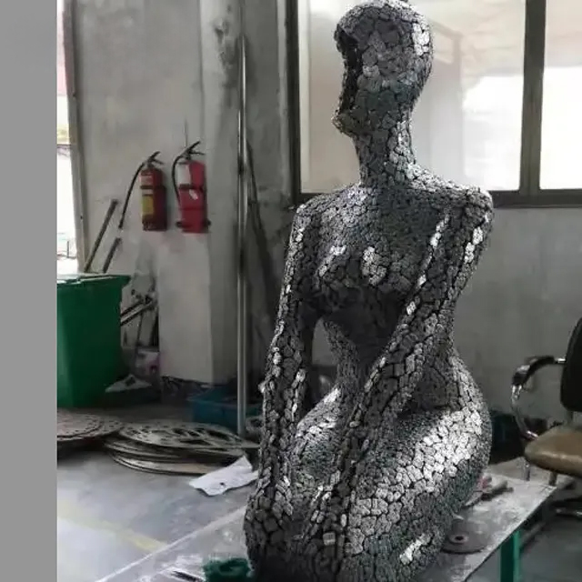 Modern Sculpture Female Figure created with welded stainless steel chain links