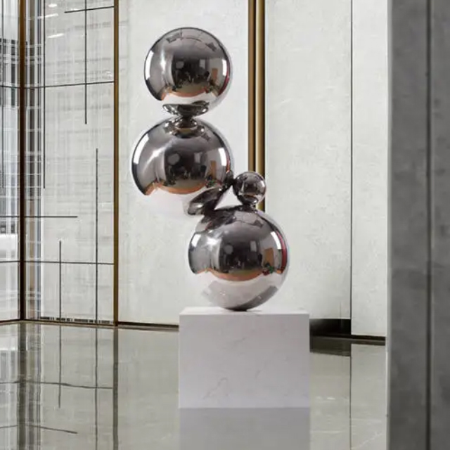 Modern abstract Stainless Steel Ball Sculpture with polished spheres stacked