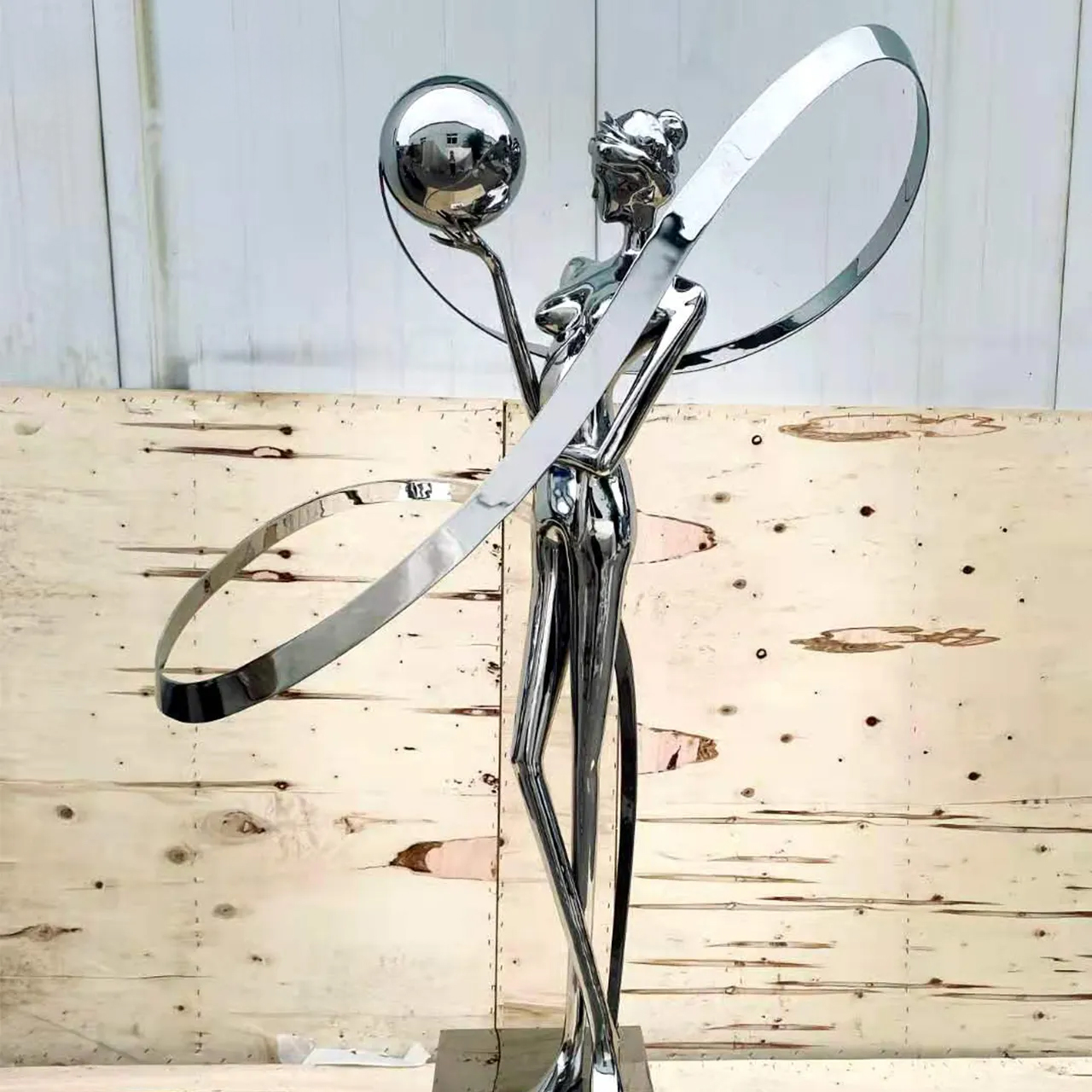 Modern stainless steel dancing figure sculpture