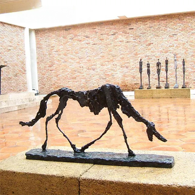 Outdoor Alberto Giacometti Le Chien Statue on stone pedestal, showcasing a gaunt figure and textured bronze surface