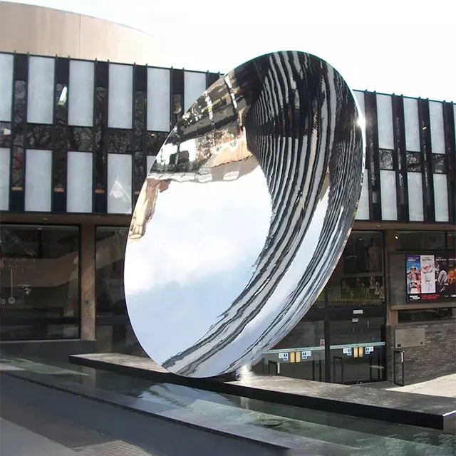Outdoor Sky Mirror Sculpture in stainless steel, tilted toward the sky