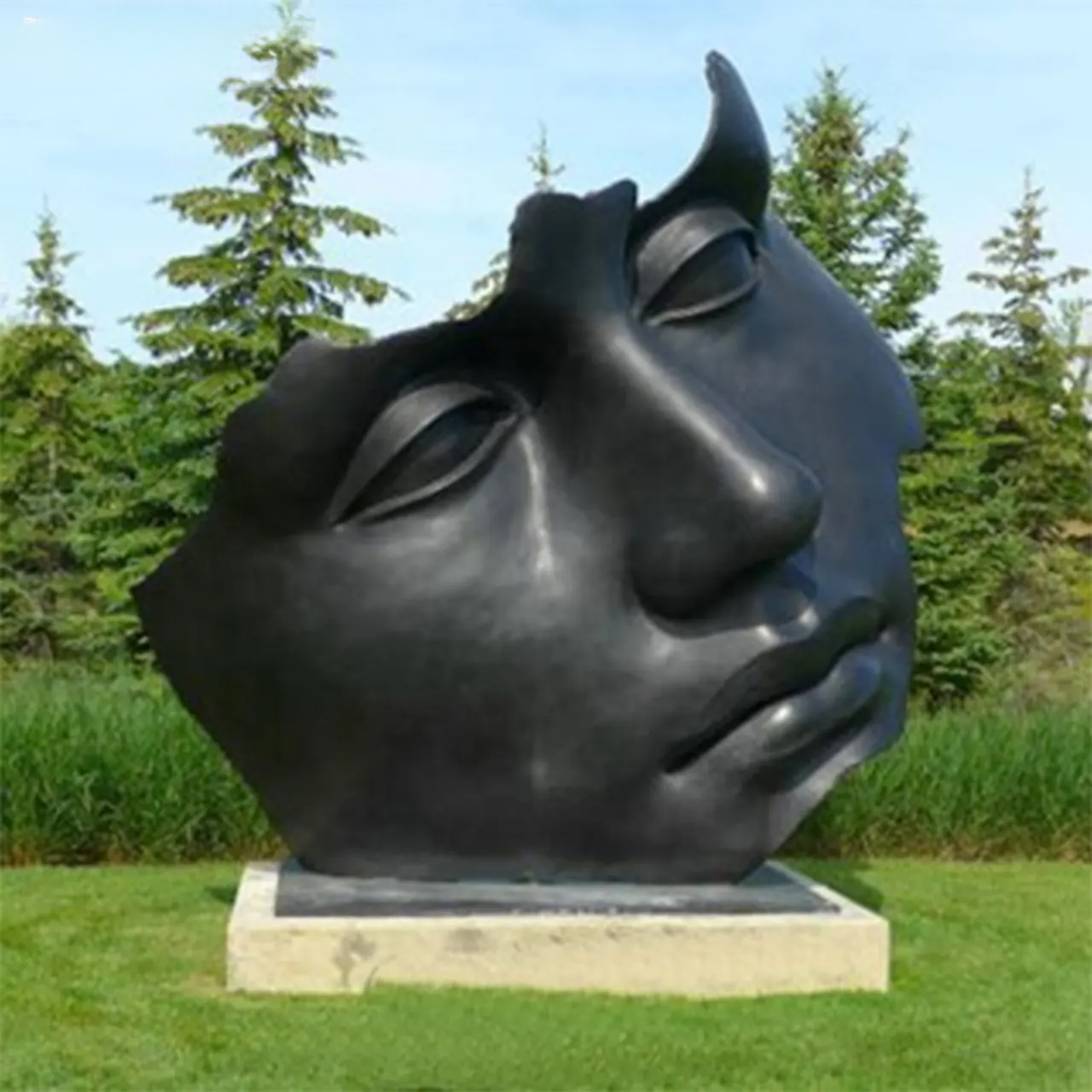 Outdoor bronze Broken Face Statue by Igor Mitoraj