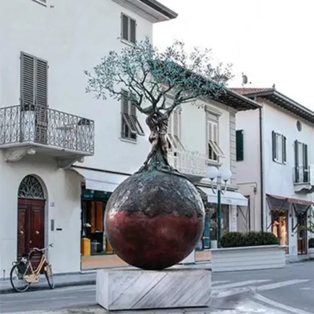 Outdoor bronze Tree of Life Garden Sculpture with oxidized texture and symbolic human-tree integration