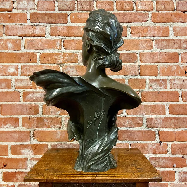 Rear view of bronze Lady Head Bust sculpture by Anton Nelson with flowing hair