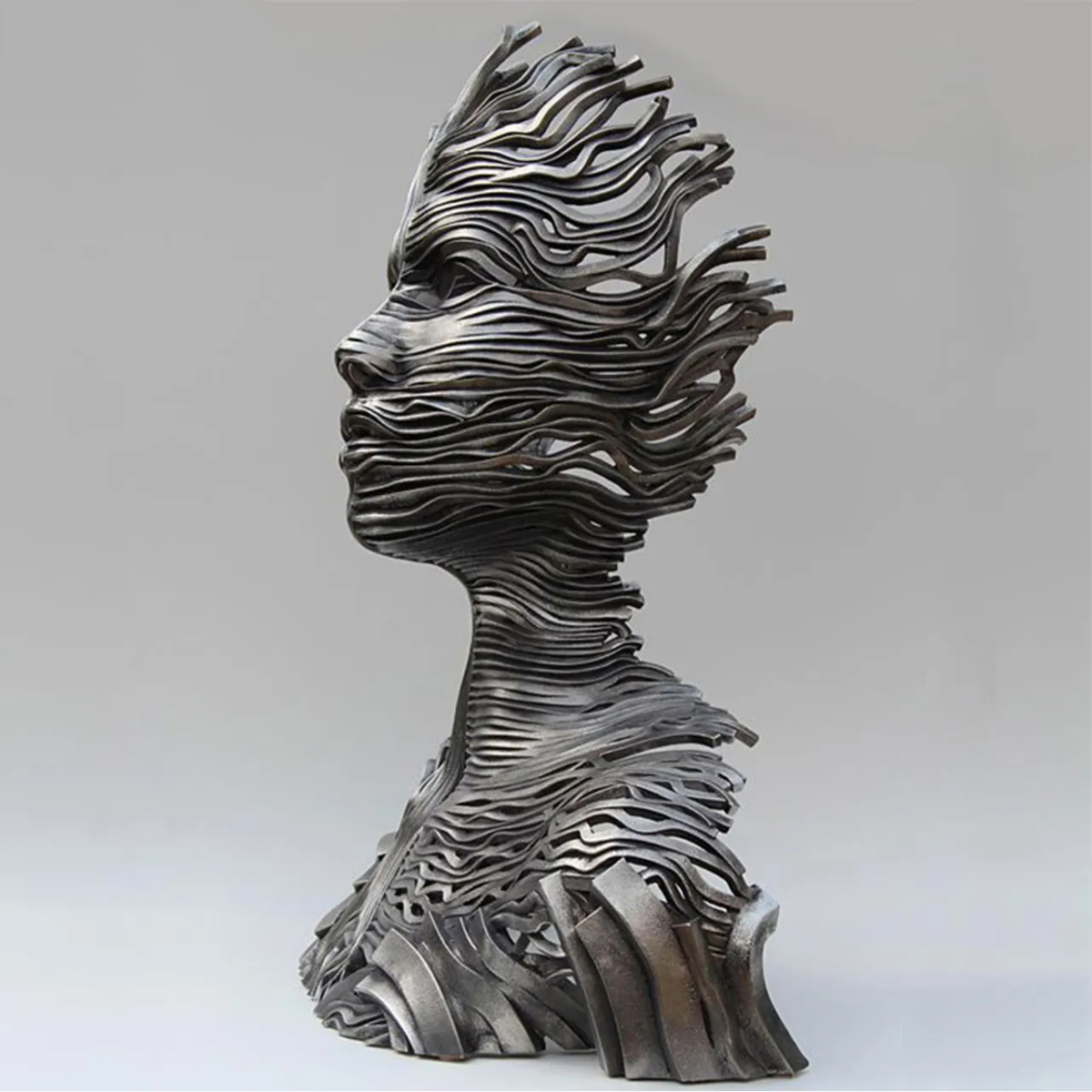 Stainless steel Gil Bruvel Sculpture for Sale featuring a female profile