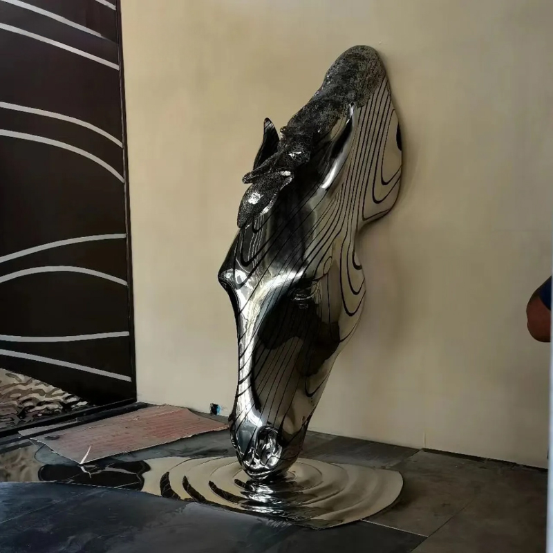 Stainless steel Modern Horse Head Sculpture mounted on the wall, depicting a horse drinking water
