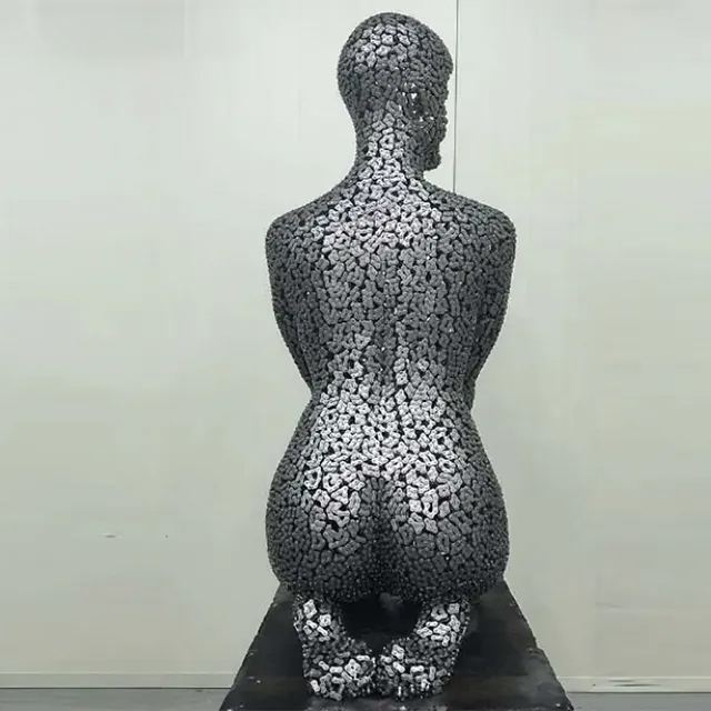 Stainless steel Sculpture Female Figure in meditative kneeling posture