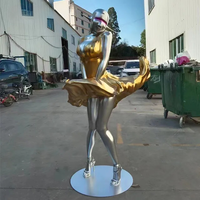 Stainless steel female statue art with gold dress and silver body